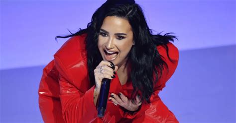 The Dog Days of Defiance:  Demi Lovato Addresses Controversial Remarks on Social Media!